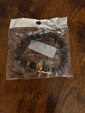 Black Lave Beaded Bracelet with Gold tone Accent Beads and Leopard Head